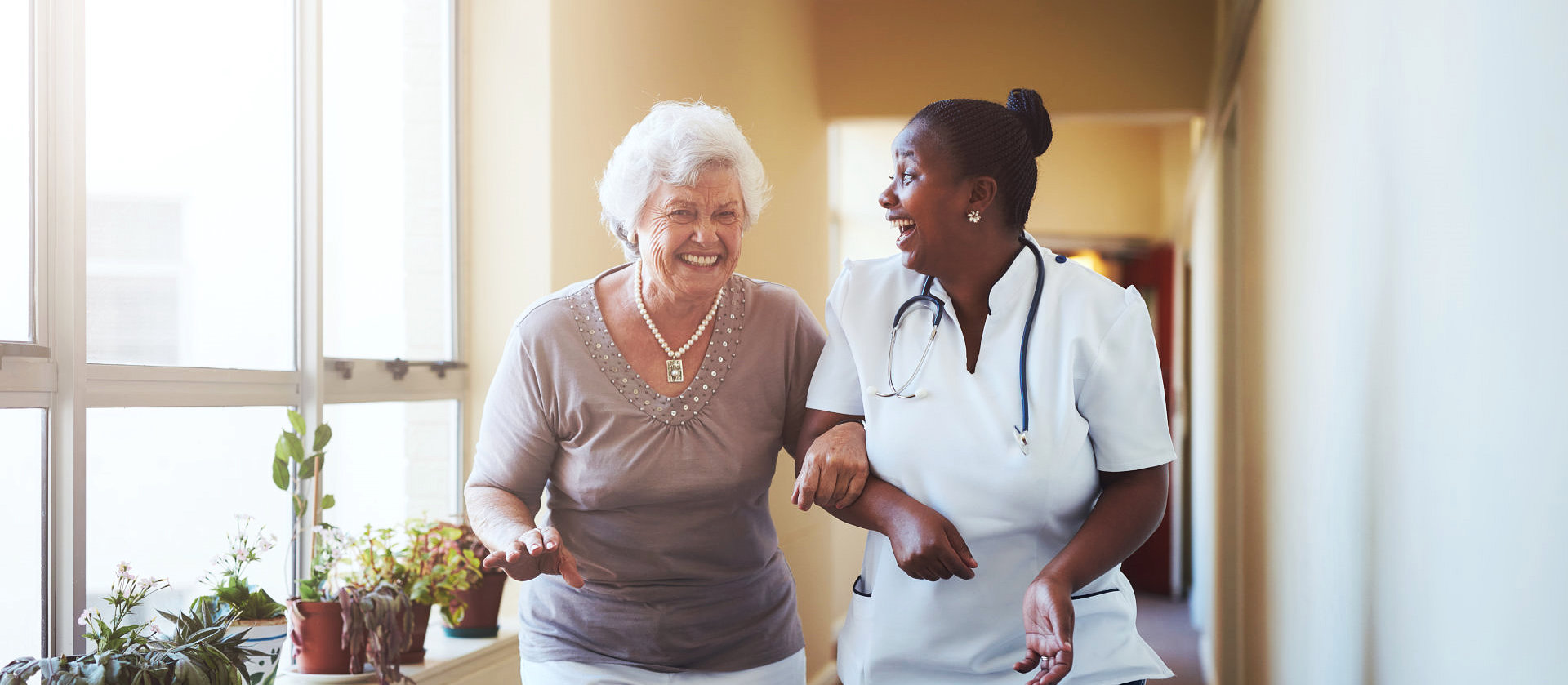 happy nurse and caregiver
