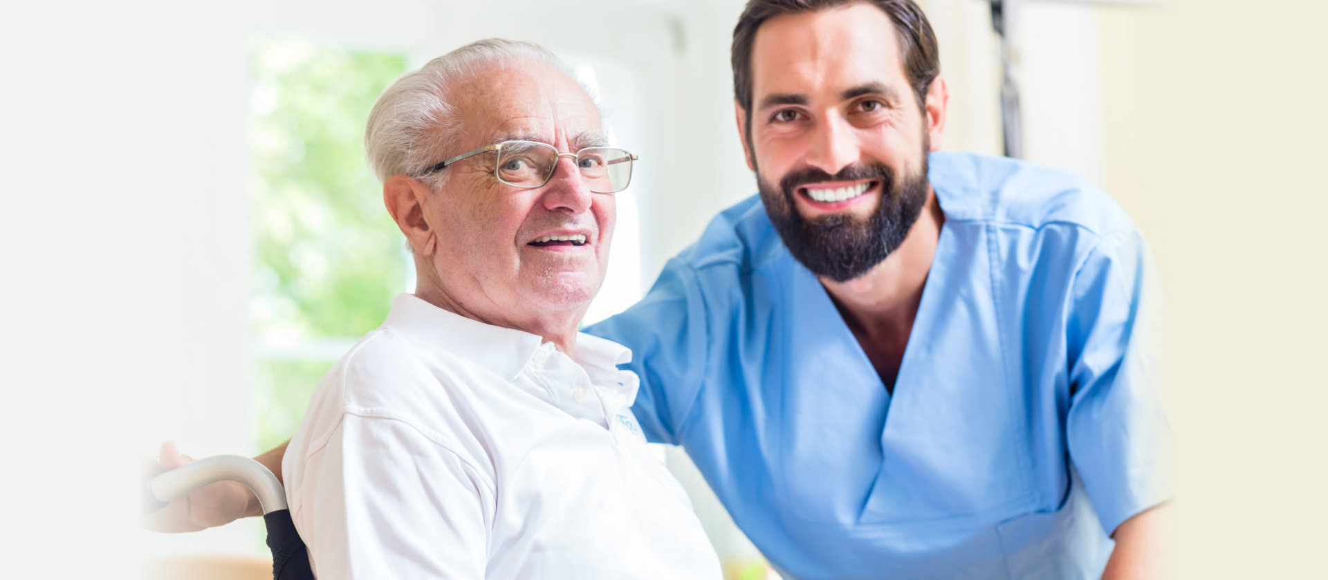 ha Senior man and nurse in rest home